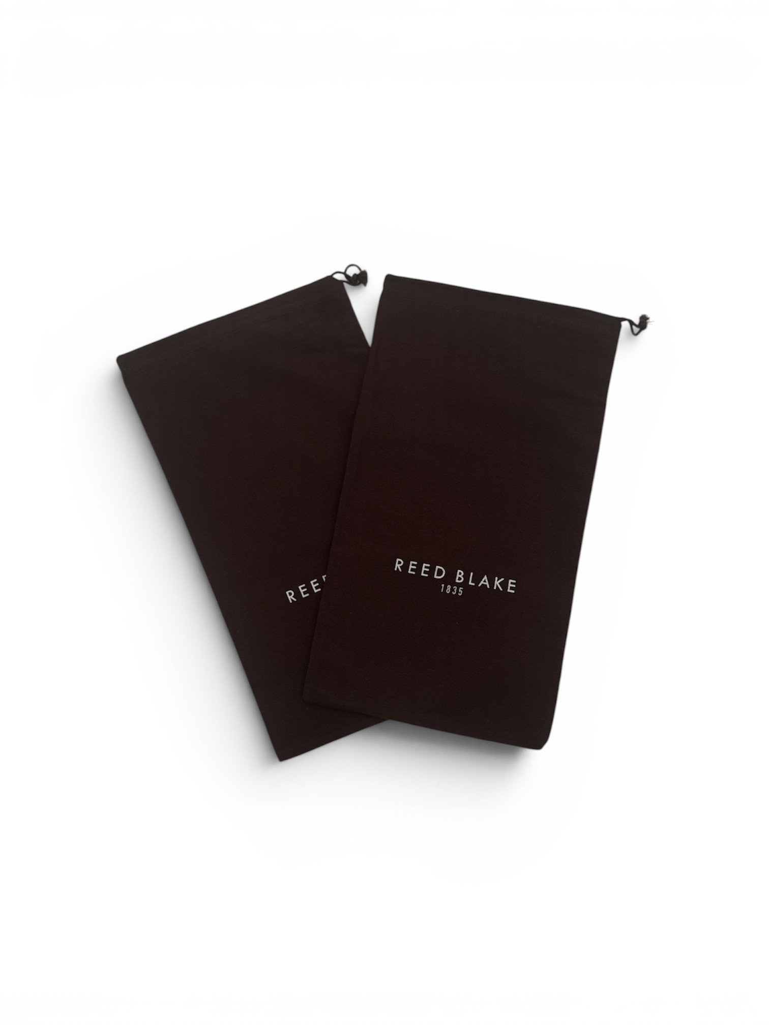 Deux pochettes en tissu marron REED BLAKE
